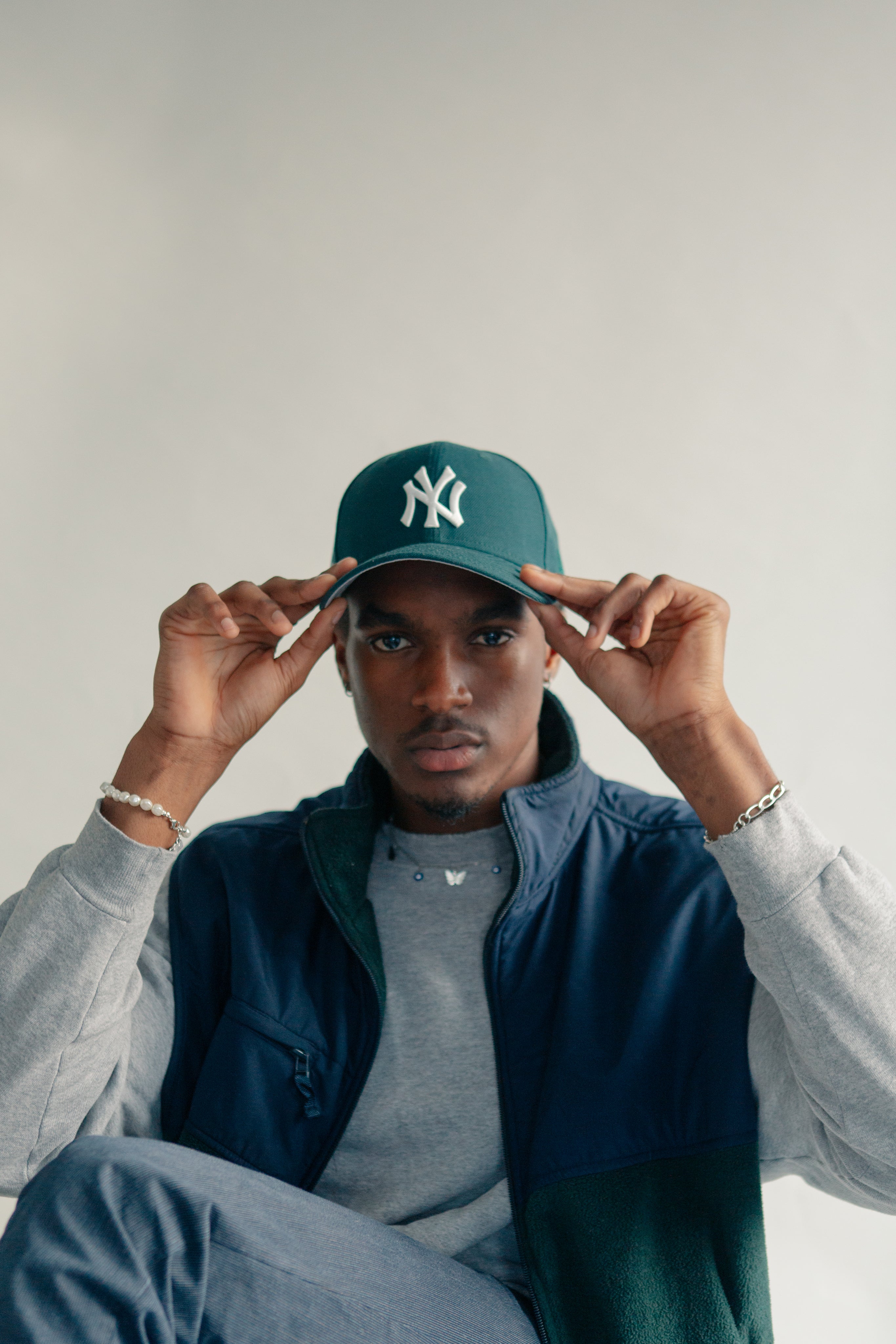 files/young-man-adjusts-his-baseball-cap.jpg