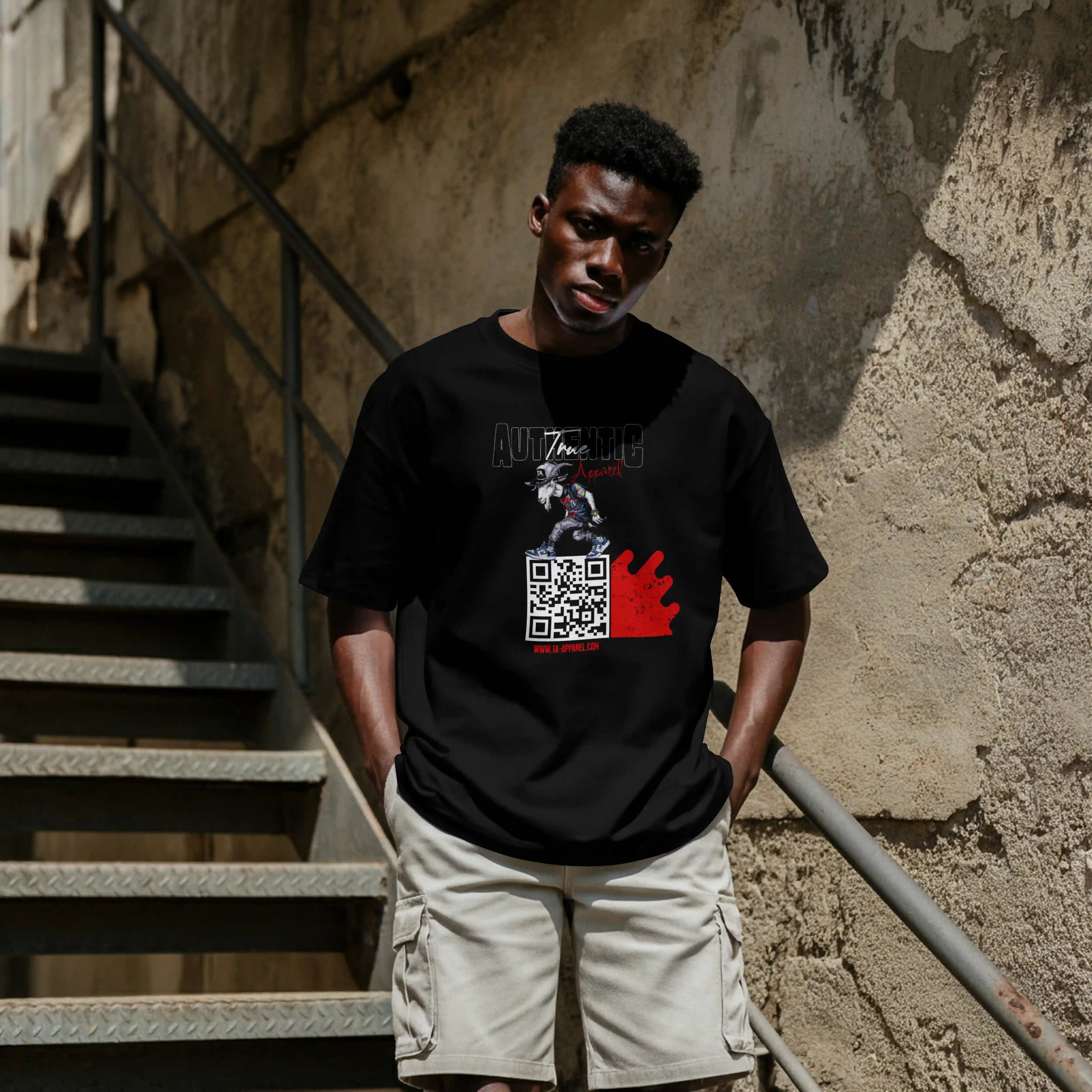 Close-up of True Authentic "Scanner" logo on a heavyweight black oversized t-shirt, Campaign Series streetwear marketing apparel.