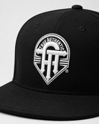 True Authentic Signature Snapback Hat – Black/White Embroidered Logo
