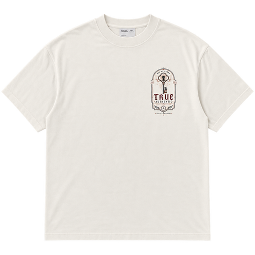 Key of Proof Tee front view with key graphic on left chest, cream colorway