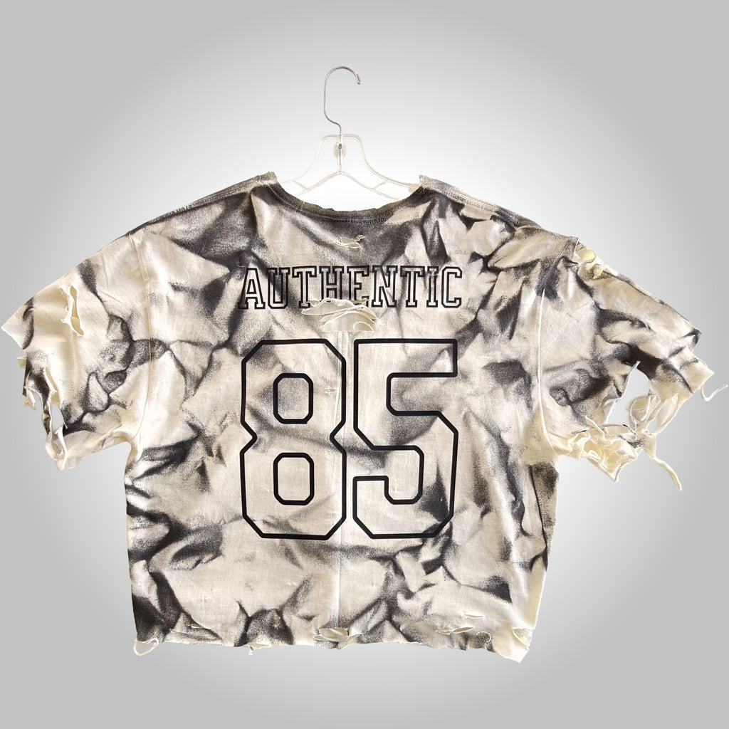 Tie-dye t-shirt with 'AUTHENTIC 85' text on a gray background