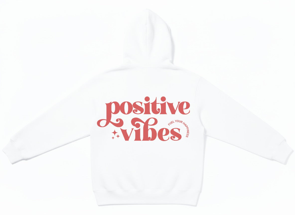 Back view of the True Authentic white heavyweight hoodie with large "Positive Vibes" and "Fuel Your Happiness" typography in red.