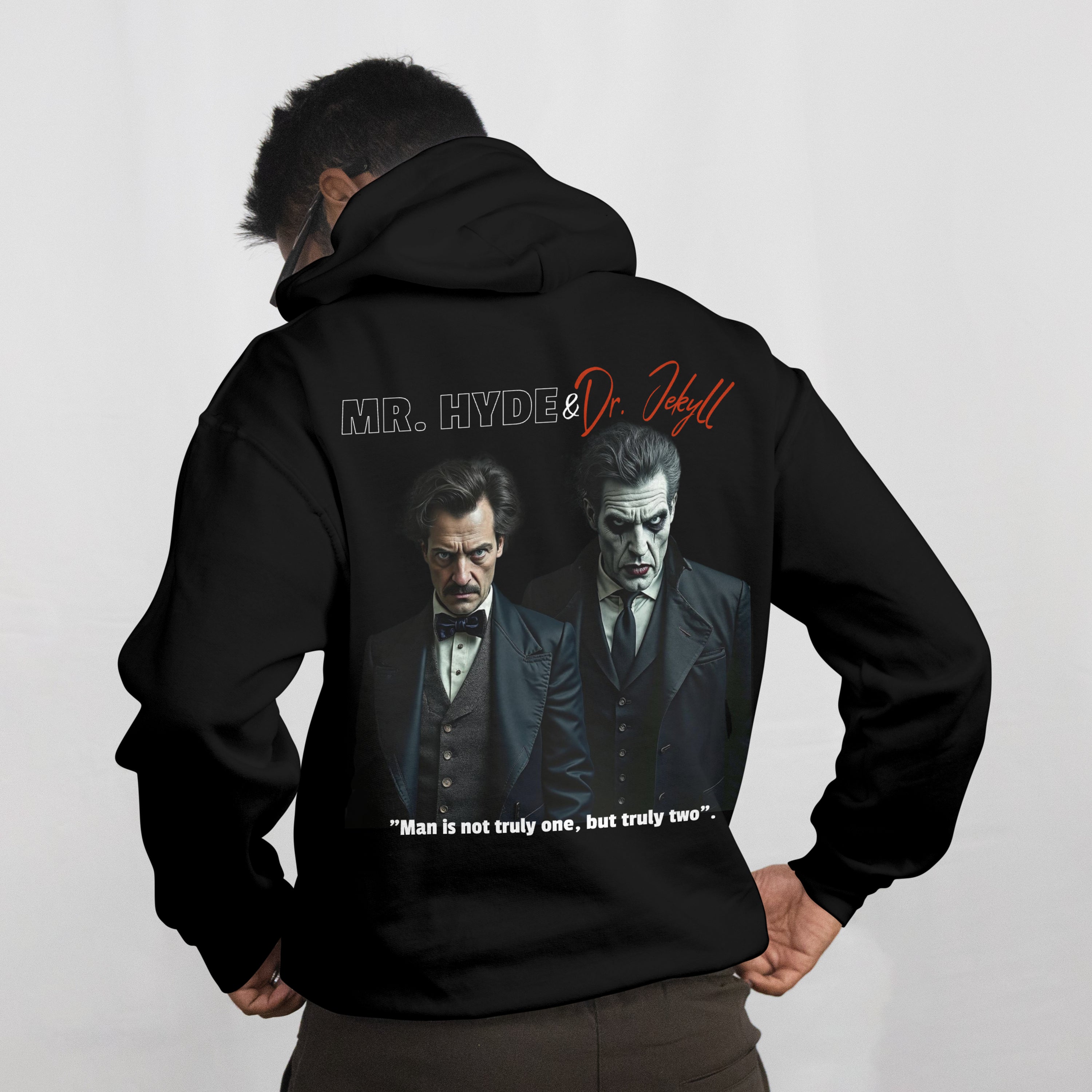 Black hoodie with a graphic of two men in suits and text on the back, on a plain background.
