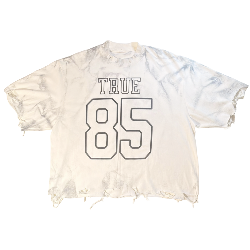 Tie-dye t-shirt with 'TRUE 85' text on a white background