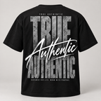 TRUE AUTHENTIC authentic script black cotton graphic tee — oversized back artwork, full view