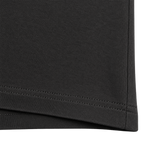 Black heavyweight cotton T-shirt fabric texture and double stitched hem detail