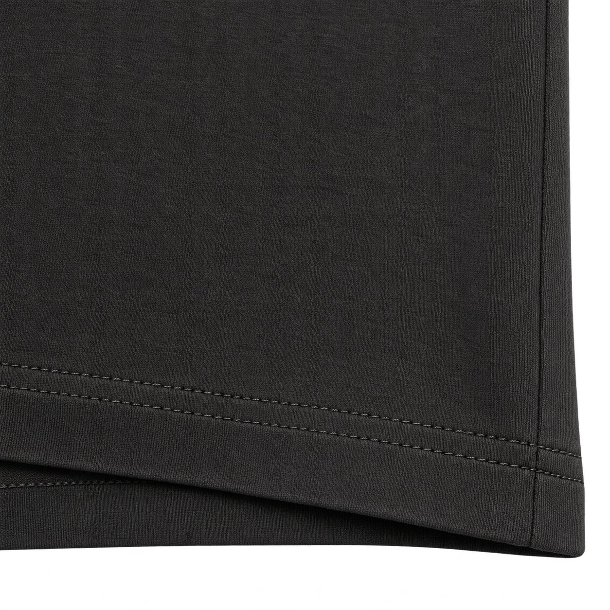 Black heavyweight cotton T-shirt fabric texture and double stitched hem detail