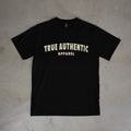Black t-shirt with 'True Authentic Apparel' text on a concrete floor