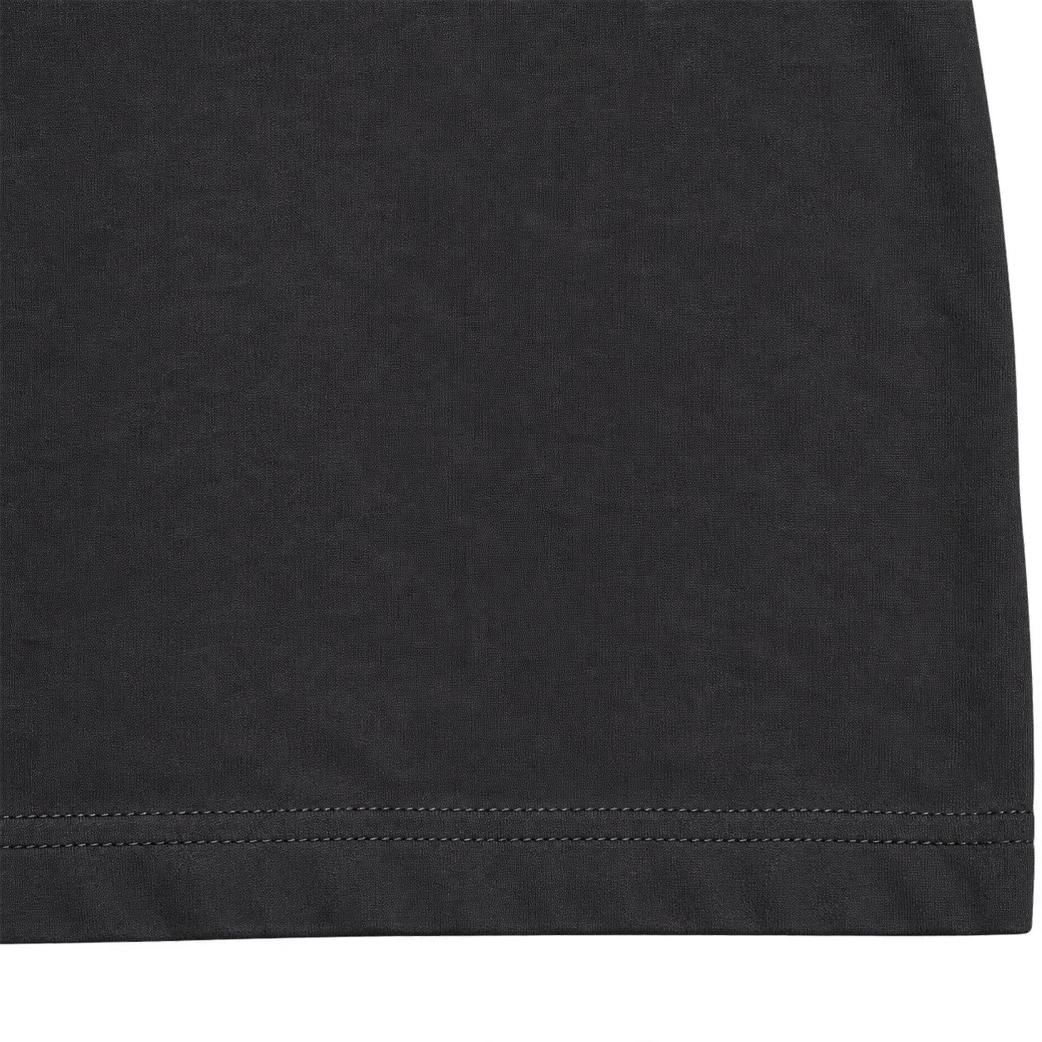 Black heavyweight cotton T-shirt fabric texture and reinforced hem detail