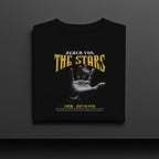 Black t-shirt with 'Reach for the Stars' text and hand graphic on a dark background
