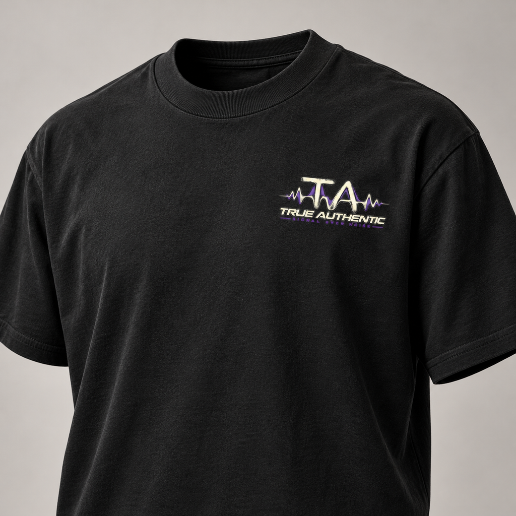 TRUE AUTHENTIC signal over noise black cotton graphic tee — small left chest logo, close-up